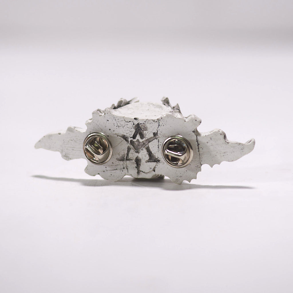 skull and leaves lapel pin back view