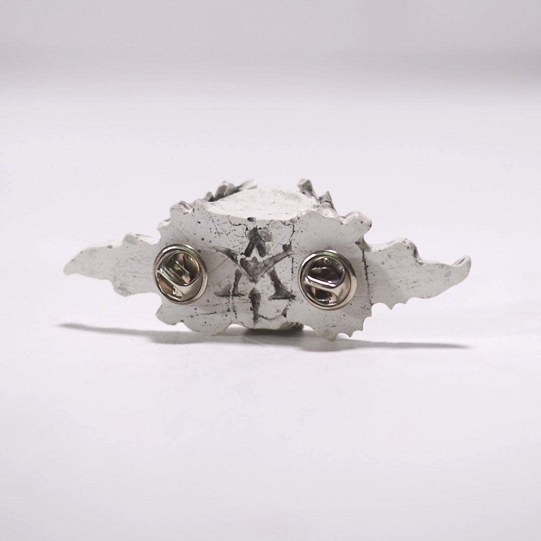 skull and leaves lapel pin back view