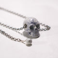 Skull Pendant bonded marble howlite and steel chain