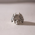 Skull ring with crown of leaves