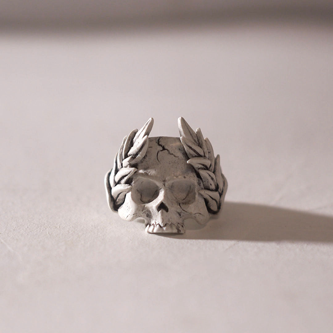 Skull ring with crown of leaves