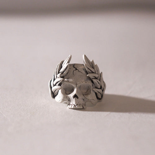 Skull ring with crown of leaves
