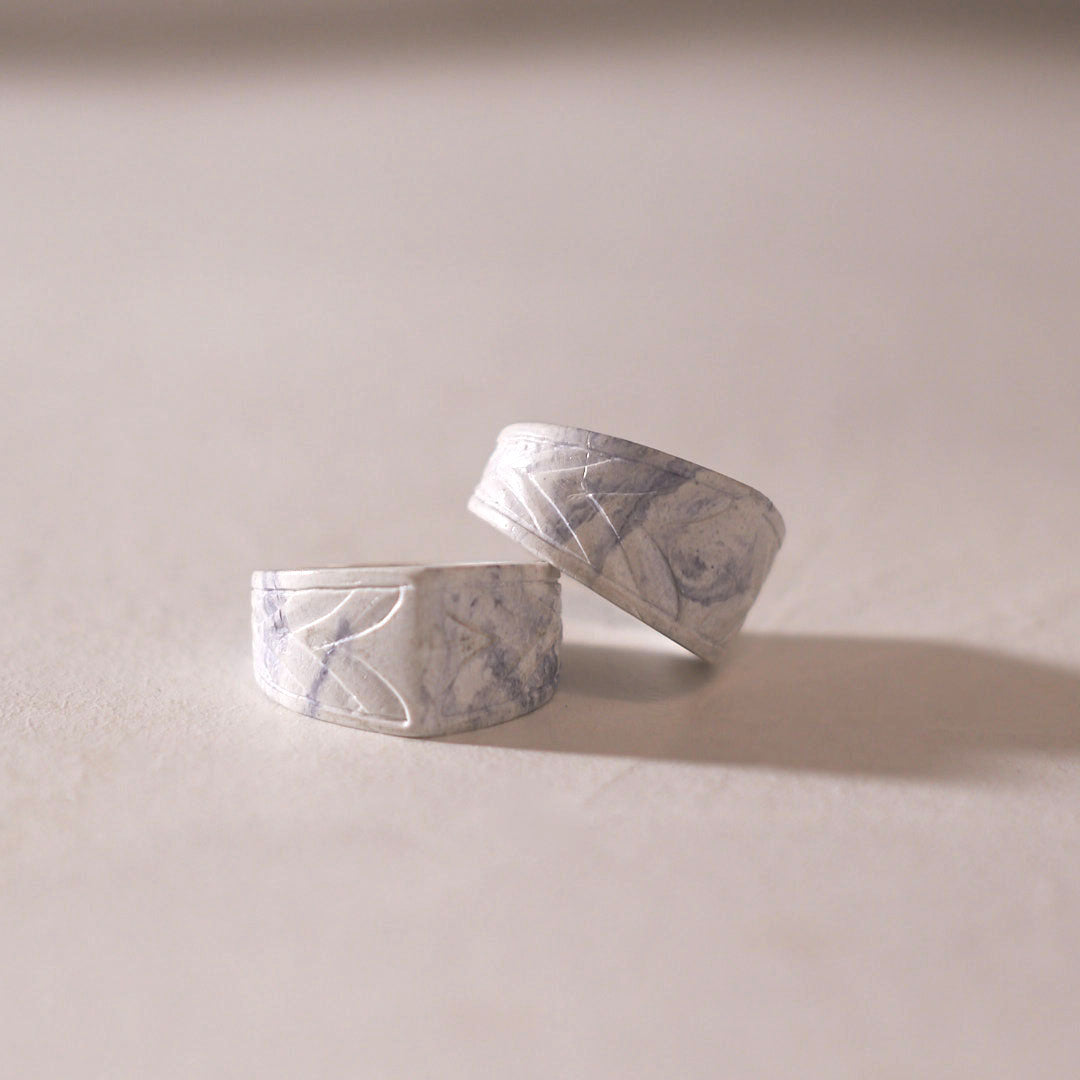 white marbled alchemy ring pair 