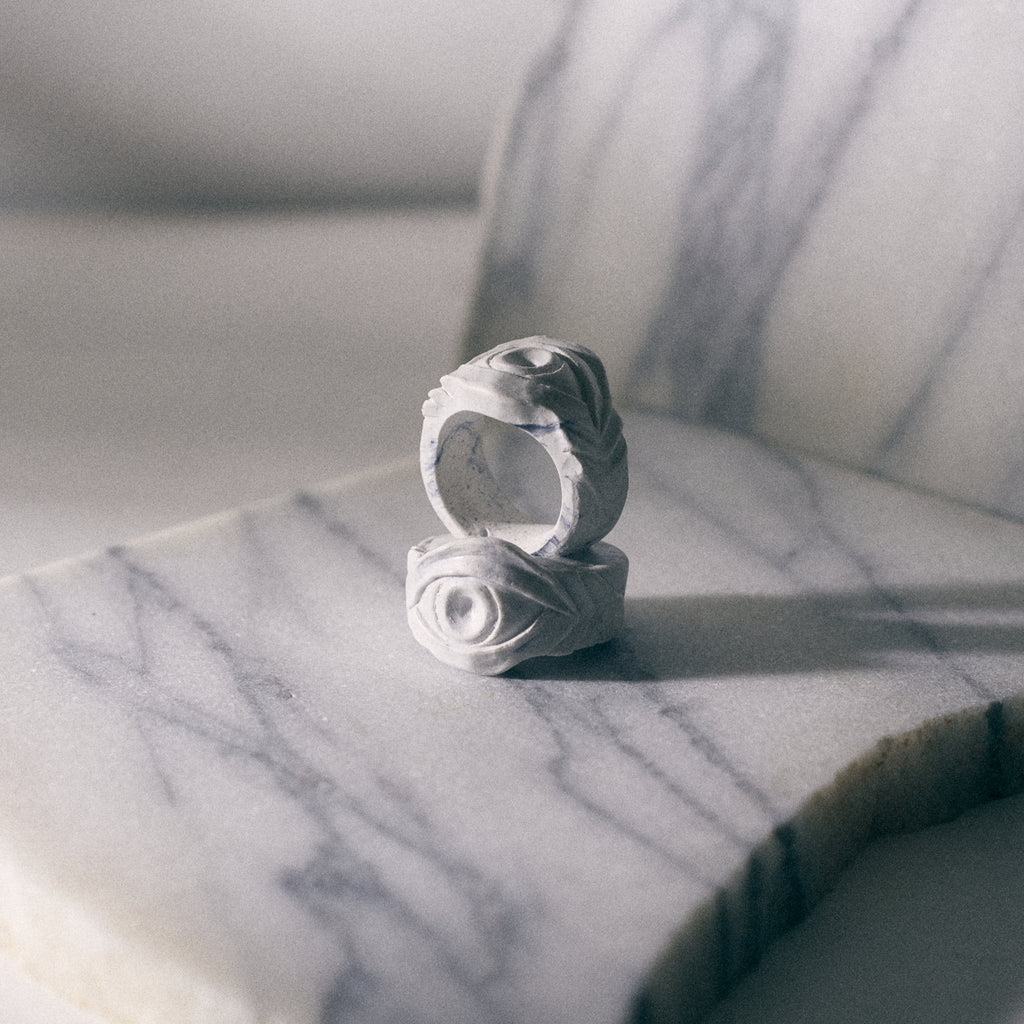 eye ring over carrara marble